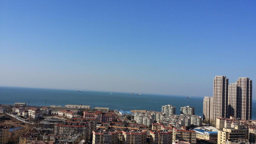 Super 8 Hotel Qingdao Railway Station Gui Zhou Road Экстерьер фото